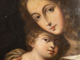 an image of a painting of a woman holding a child in her arms