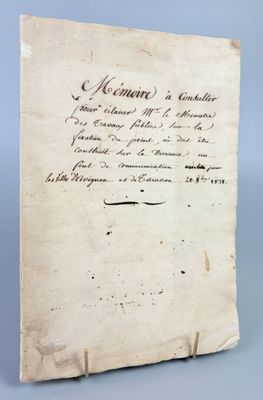a piece of paper with writing on it sitting on top of a table