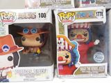 three pop vinyl figures of one person in a top hat and one in a top hat and one in a top hat and one in a top hat