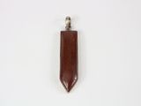 a wooden pendant with a silver clasp on a white background