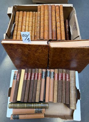 boxes of cigars are stacked on top of each other on a table