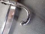 a close up of a metal object on a cloth