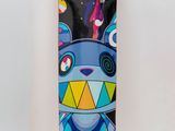 a skateboard with an image of a cartoon character on it