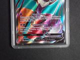 a close up of a pokemon card on a table