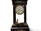 a clock that is sitting on top of a table