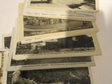 several old black and white photos of a train on a table