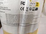 a close up of a bottle of liquid on a table