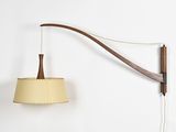 an image of a wall mounted lamp on a wall next to a lamp shade