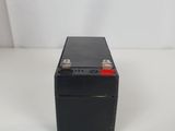 a black battery box sitting on top of a white table