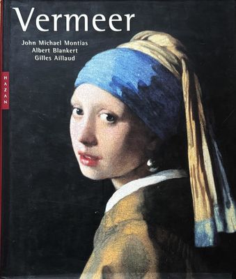 the cover of a book with a painting of a girl with a pearl ear