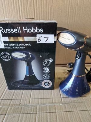 a box of russell hobbss hair dryer next to a box of other items