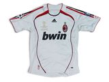 a white shirt with a black and red stripe on the chest