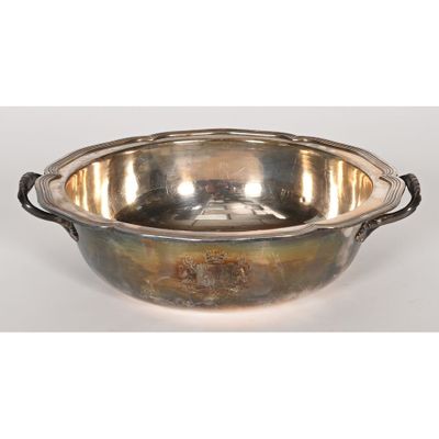an antique silver plated bowl with handles and handles