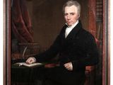 a painting of a man in a black suit sitting at a desk