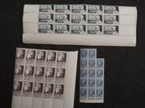 a lot of stamps that are on the table