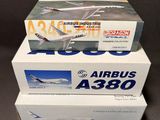 two boxes of airbus a380 and a380 are stacked on top of each other