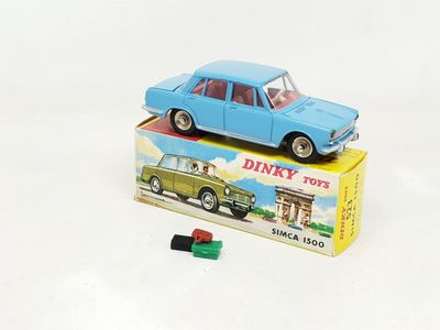a blue toy car sitting on top of a box