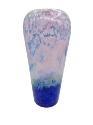 a blue and pink vase sitting on a white surface