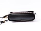 a black and brown leather case with a metal clasp