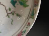 a white plate with a floral design on it