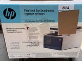 a box with a printer on it sitting on a table