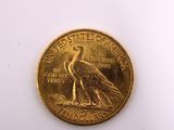 an image of a gold coin with a bird on it