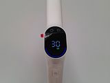 a toothbrush that has a digital display on it