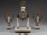 a clock that is sitting on top of a table