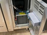 a stainless steel refrigerator that is open to show the inside of it