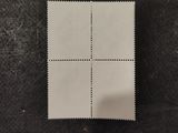 a close up of a piece of paper with four squares on it