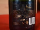 a bottle of wine that is sitting on a table