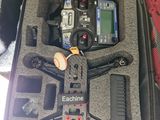 a case that has a remote control and other items in it
