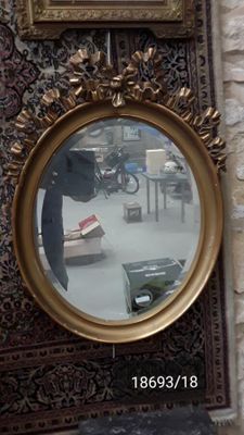 a picture of a mirror on the wall of a building