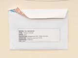 a white envelope with a red and blue stamp on it