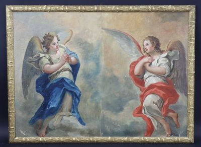 deux tableaux représentant des anges, dans un cadre doré, sur fond bleu