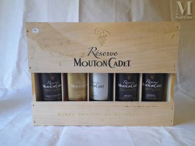 a wooden box with four bottles of wine in it