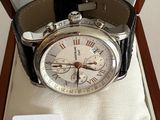 a watch in a box with a price tag on it