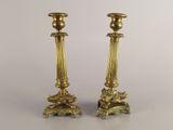 pair of antique brass candlesticks with lion heads