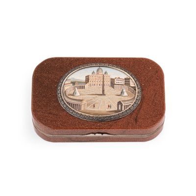 a small box with a picture of a castle on it