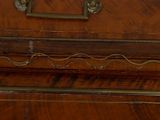 a wooden case that has a handle on it