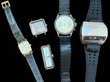 Plusieurs modèles de montres sont présentés sur un fond noir