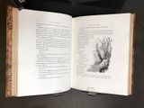 an open book with a picture of a cat on it