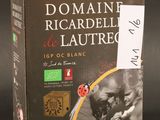 emballage d'une boîte de vin sur laquelle figure une coccinelle