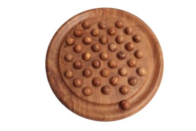 a wooden board with a lot of balls on it