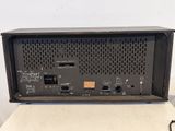 an image of a black electronic device sitting on top of a table