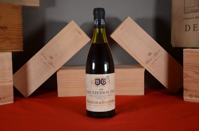 a bottle of wine that is sitting on a table