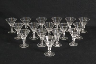 a group of wine glasses sitting on top of a black table