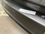 a sticker on the bumper of a car that says outuaia
