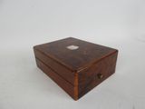 an image of a wooden box on a white surface