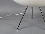 an image of a white chair with a light on it